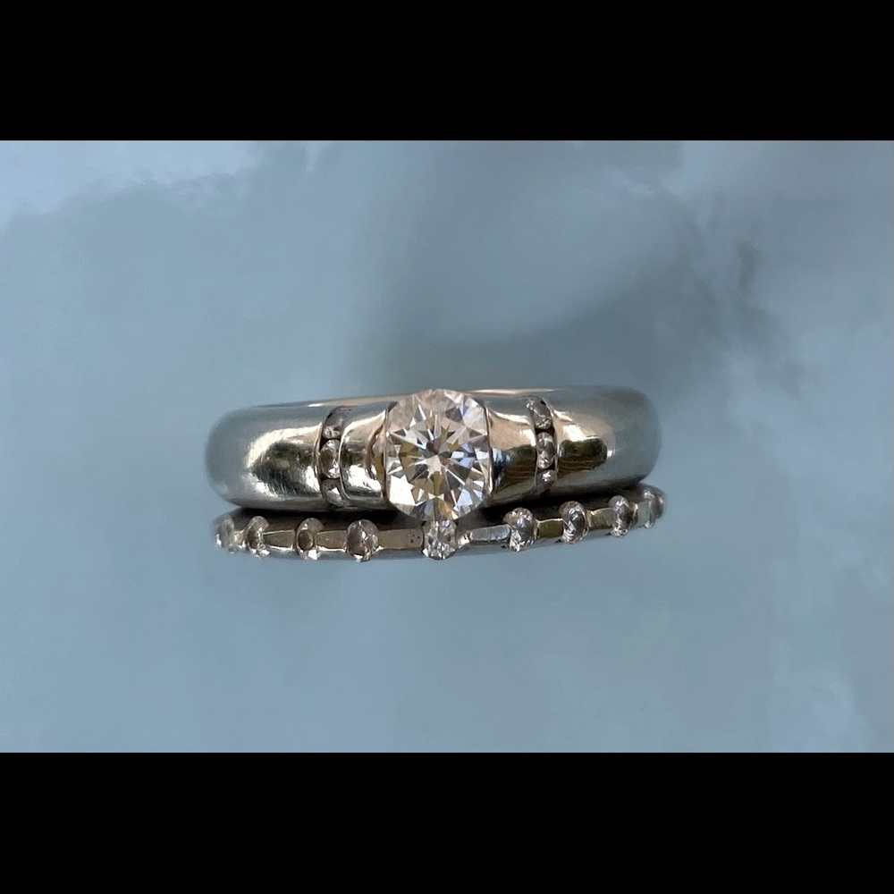 Gelin Abaci tension set engagement ring and wedding band.